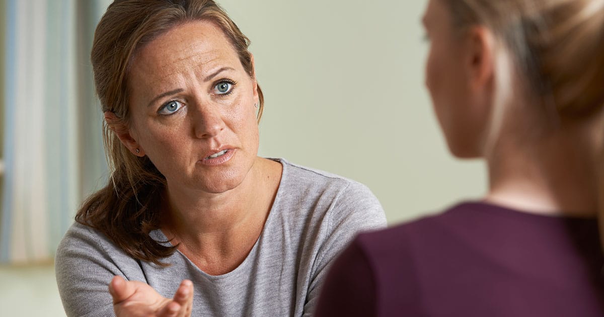 substance abuse counselor with patient